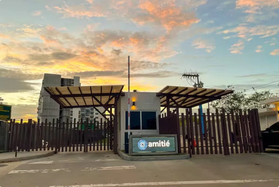 Amitié complex entrance gate at sunset, Tocumen Panama