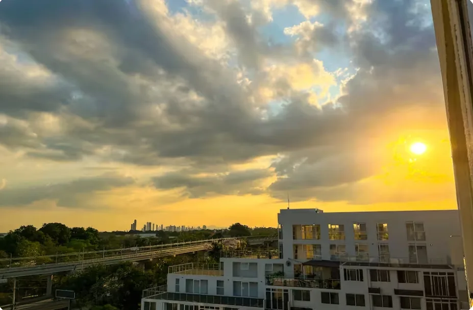 Panoramic sunset view of Panama City skyline from apartment near Tocumen
