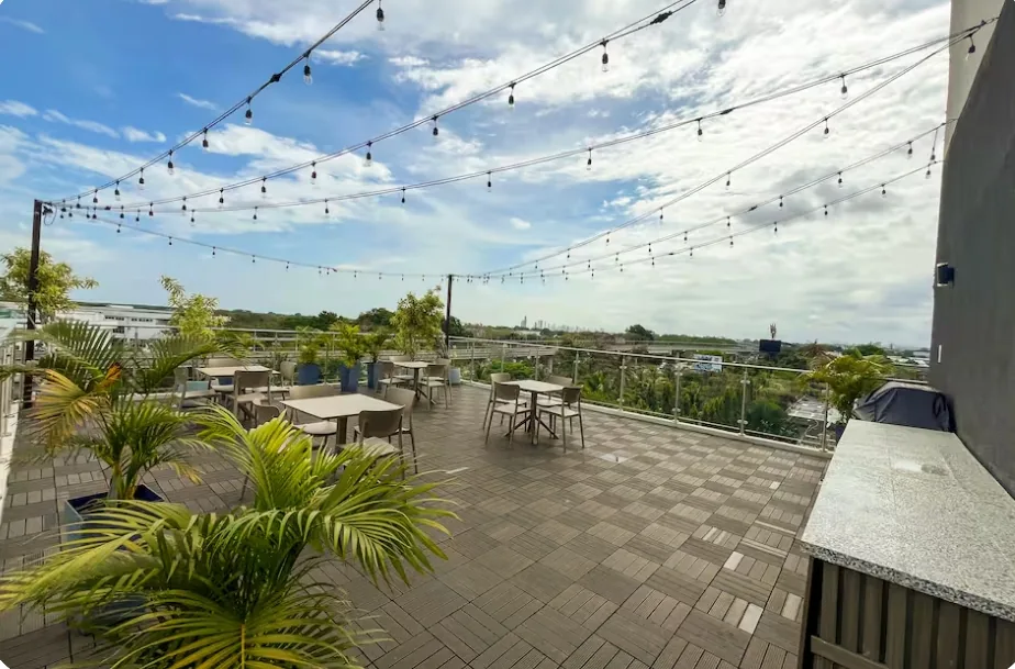Rooftop terrace with string lights and outdoor seating near Tocumen Panama